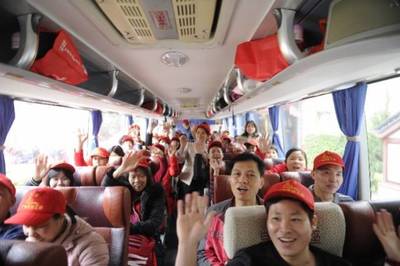 11輛長途客車,免費送廣州500多名農民工平安返鄉